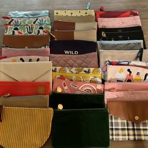 Bundle of 34 slightly used Ipsy bags